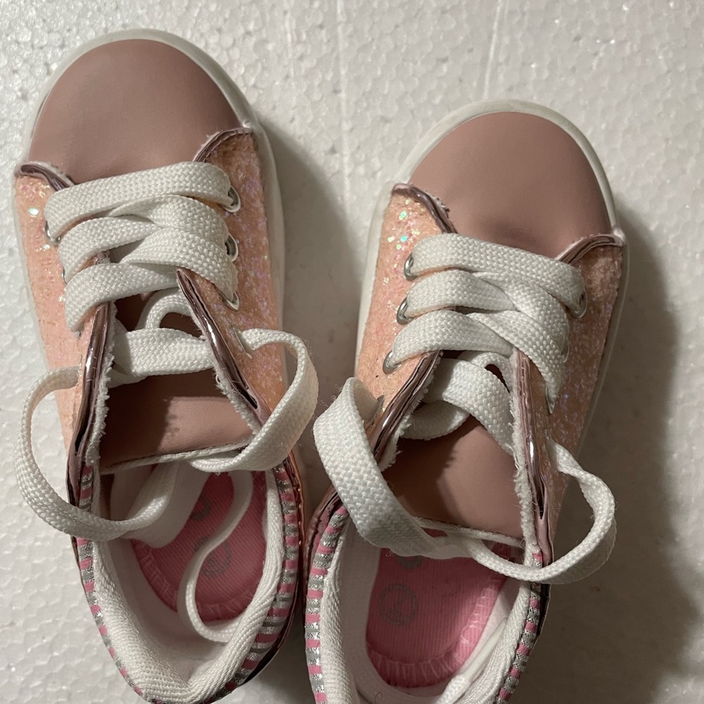 Pink shoe with glitter on side